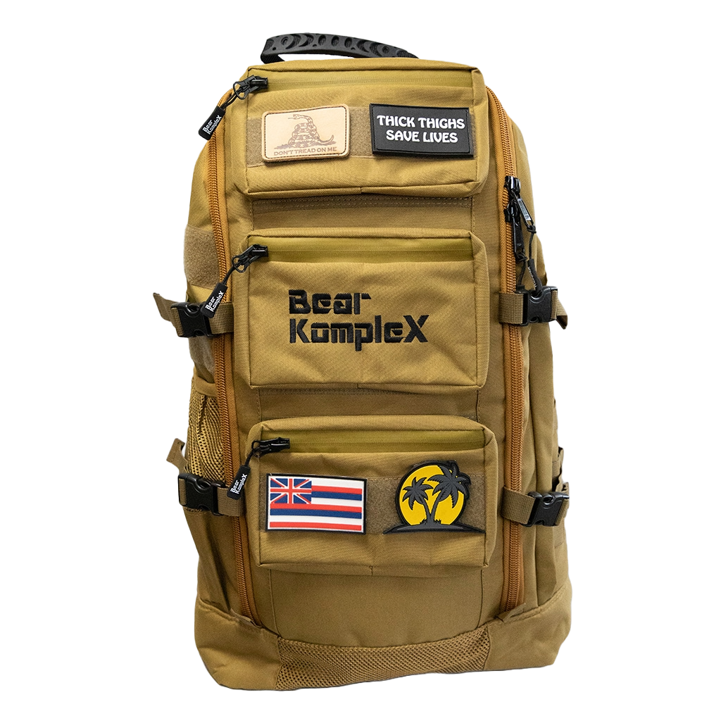Bear KompleX BKX military backpack with multiple compartments and padded straps, designed for durability and outdoor use.