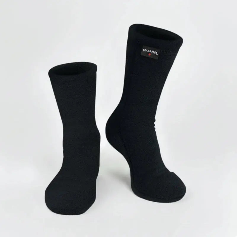 Black Polar Feet Supersoft fleece socks displayed on a neutral background, showcasing cozy, thick knit fabric for cold weather comfort.