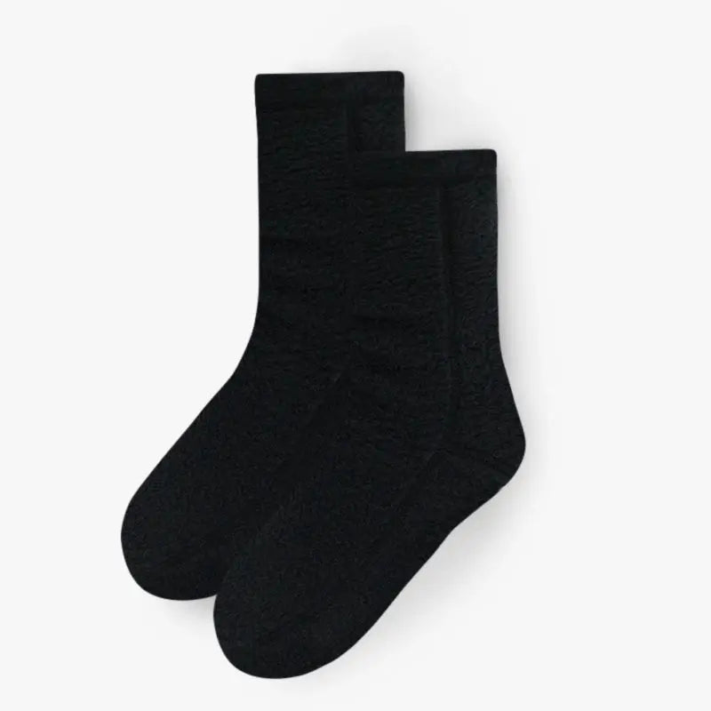 Black Polar Feet Supersoft Fleece Socks with cozy, plush fleece material designed for warmth and comfort.