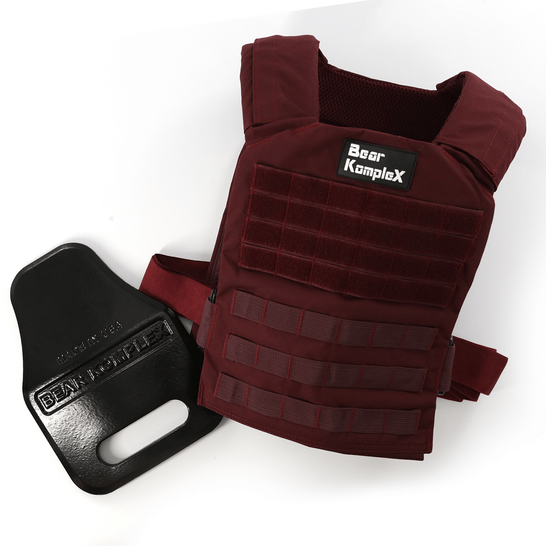 Pair of black Bear KompleX weight vest plates, durable metal inserts for adjustable weight vest fitness training.