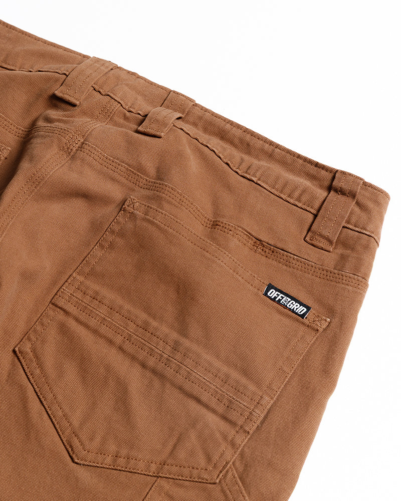 Men's denim Hardened Double Knee Pant by Off The Grid Surplus in tobacco color, flat lay showing rugged double knee design.