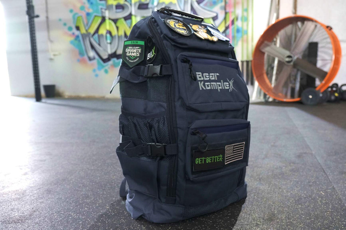 Bear KompleX BKX military backpack with multiple compartments and adjustable straps, designed for durability and outdoor use.