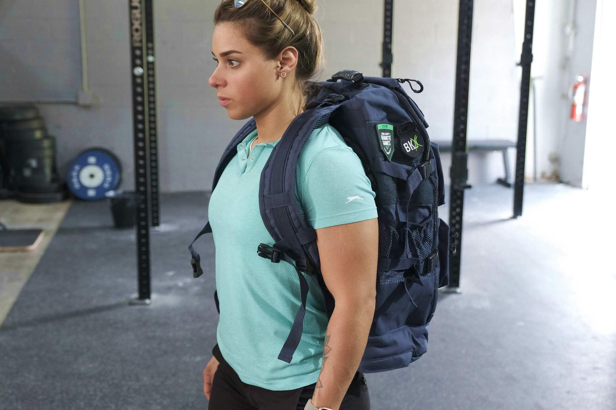 Bear KompleX BKX military backpack with multiple compartments and adjustable straps, designed for durability and outdoor use.