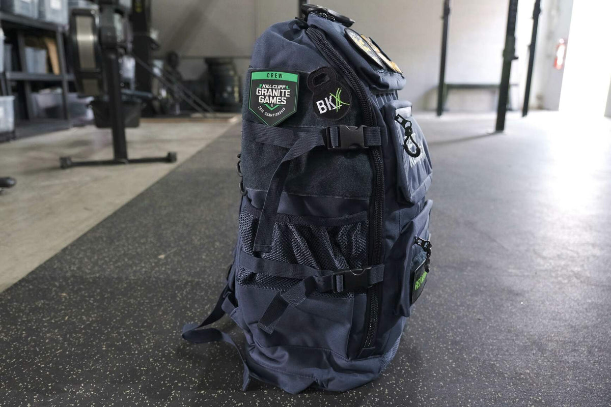Bear KompleX BKX military backpack with multiple compartments and durable straps, designed for outdoor and tactical use.
