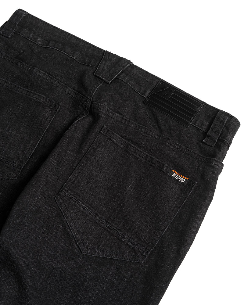 Black men's denim taper fit pants from Off The Grid Surplus, showing the stylish tapered cut and denim texture.