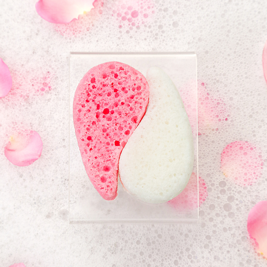 Spongellé Awaken Mani-Pedi Bundle pedi buffer with grapefruit blush scent and soft exfoliating surface, perfect for skincare routines.