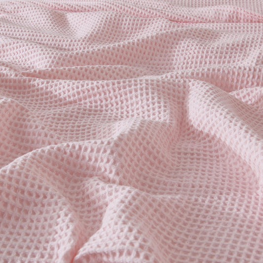 Cotton waffle weave blanket from Great Bay Home's Mikala Collection, showcasing soft, textured 100% cotton fabric.