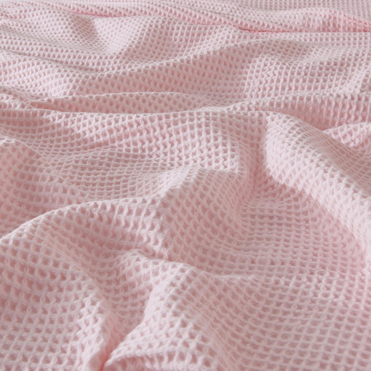 Cotton waffle weave blanket from Great Bay Home's Mikala Collection, showcasing soft, textured 100% cotton fabric.