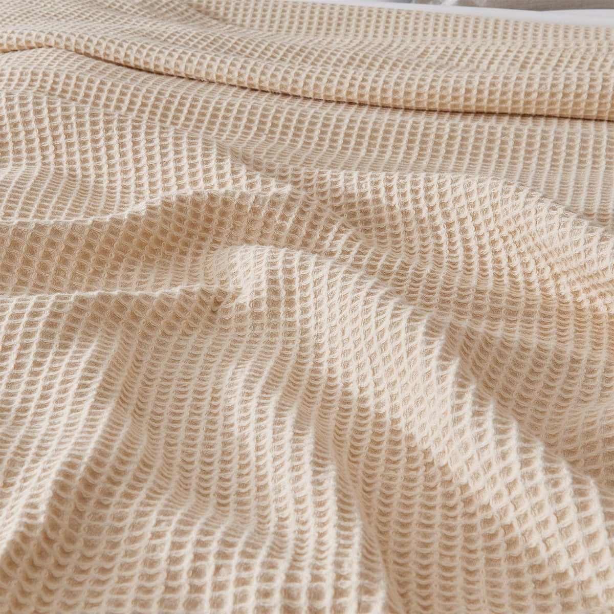 100% cotton waffle weave blanket from the Mikala Collection by Great Bay Home, shown in natural beige with textured pattern.