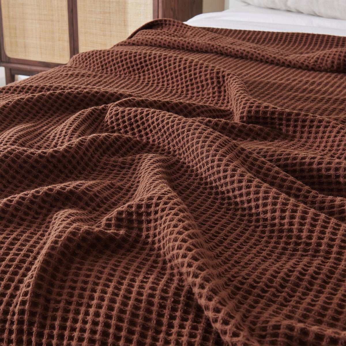 Great Bay Home cotton waffle weave blanket from the Mikala Collection, featuring soft, textured 100% cotton fabric.