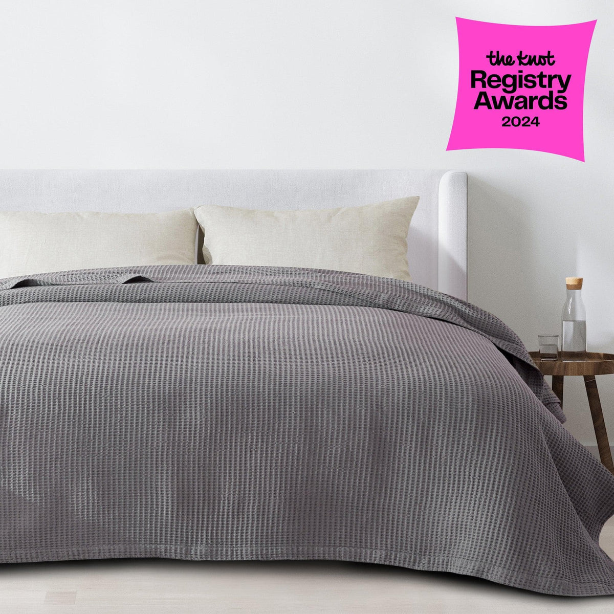 Soft white 100% cotton waffle weave blanket from Great Bay Home's Mikala Collection, featuring textured pattern and cozy fabric.