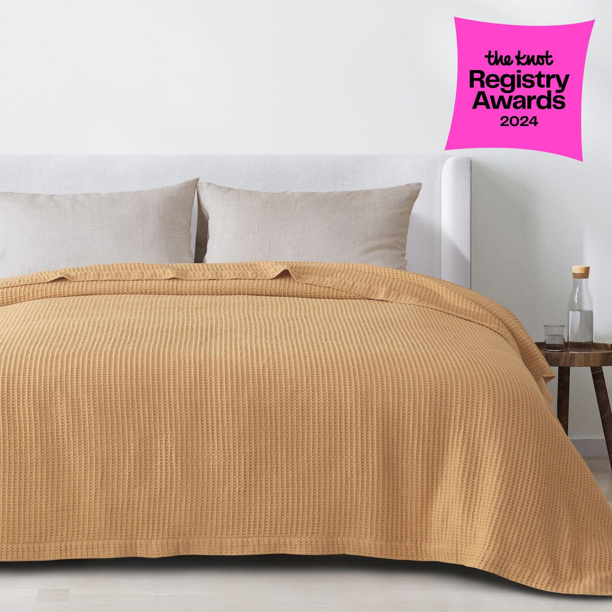 Cream-colored 100% cotton waffle weave blanket from Great Bay Home’s Mikala Collection, soft and cozy for bed or sofa.