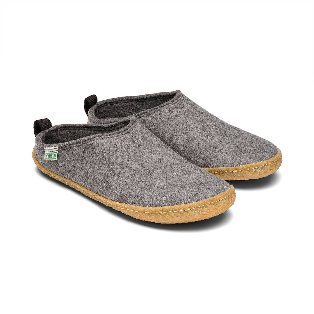Kyrgies outdoor wool slides featuring cozy wool uppers and durable soles, perfect for comfortable outdoor wear.