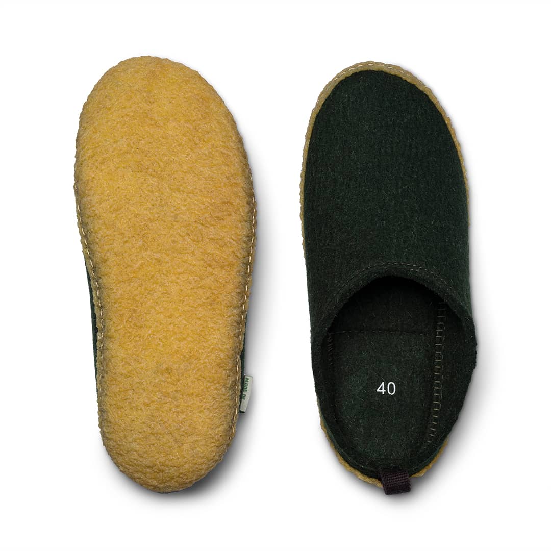 Kyrgies outdoor wool slides featuring soft wool straps and durable soles, perfect for casual outdoor wear.