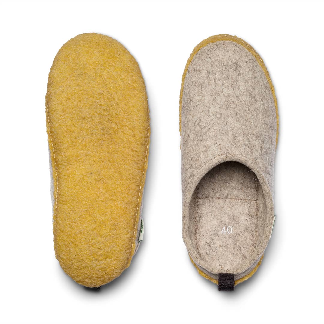 Kyrgies outdoor wool slides featuring cozy wool material and slip-on design, ideal for casual outdoor wear.