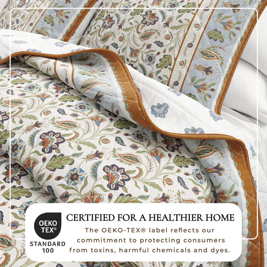 Colorful floral boho printed cotton quilt set from Great Bay Home's Indira Collection, featuring vibrant patterns and cozy bedding.