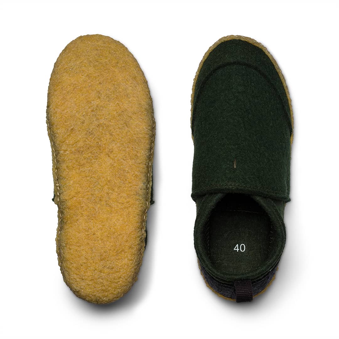 Kyrgies Tengries Walkabouts, casual slip-on shoes with leather upper and woven design, displayed on a white background.