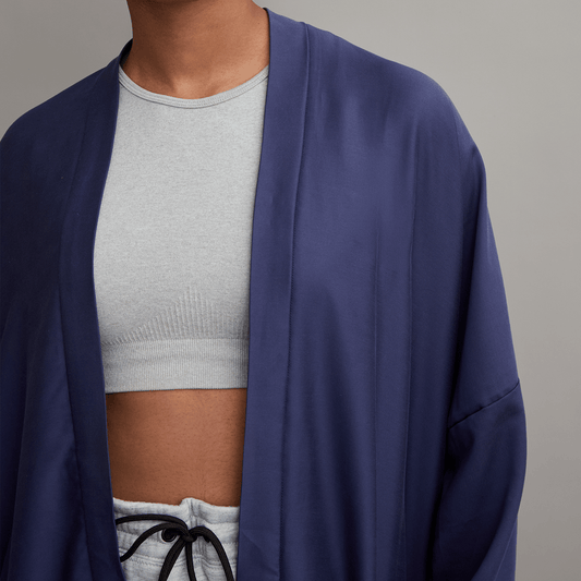 Kyrgies Zero-Waste Kimono robe in soft fabric, featuring a relaxed fit with wide sleeves and a tie waist design.