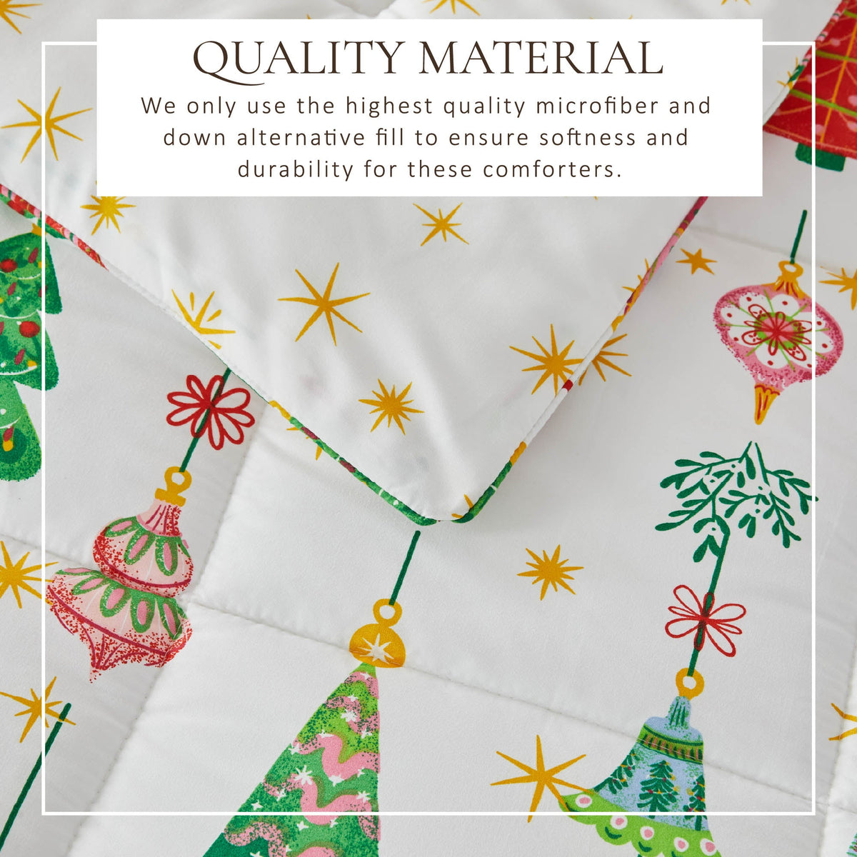 Reversible Christmas comforter and sham set from Great Bay Home featuring holiday lodge design in festive red and green.