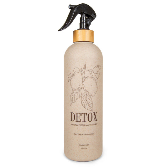 Yoloha Yoga 16oz all-purpose yoga mat cleaner bottle, eco-friendly disinfectant for yoga mats and workout gear.