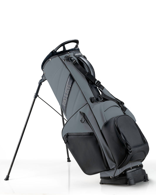 Player Preferred™ Golf Bag by Pins and Aces in Flat Ash color, featuring multiple compartments and a comfortable strap for golfers.