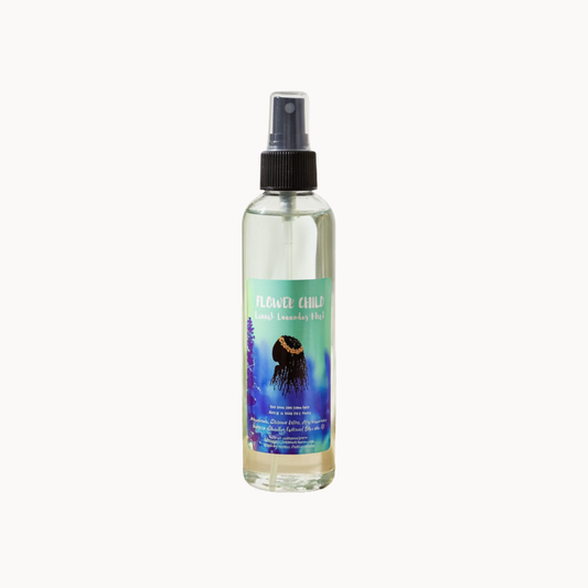 Lavish Lavender Mist by Flower Child Loc Care LLC, a hair and skin care spray with lavender scent, in a clear bottle with a spray nozzle.