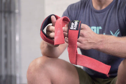 Pair of Bear KompleX lifting straps for weightlifting and strength training, made of durable material with padded grips.