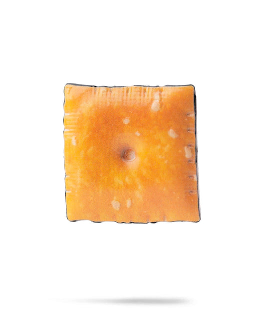 Pins and Aces cheese cracker ball marker accessory featuring a colorful, detailed cheese cracker design for golf markers.