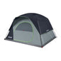 Coleman Skydome three-season tent set up outdoors, showcasing its spacious design and durable fabric for camping trips.