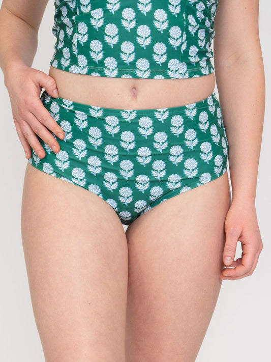 Lime Ricki Juniper Charm high-waist swim bottoms in navy with decorative charm and full coverage fit.
