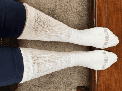 Men's DSC ultra-soft upper calf diabetic socks, four pairs, with seamless design and cushioned sole for comfort and support.