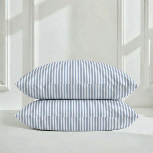 Set of two Luxe Australian Sateen pillowcases in soft, smooth fabric with a subtle sheen, perfect for elegant bedroom decor.