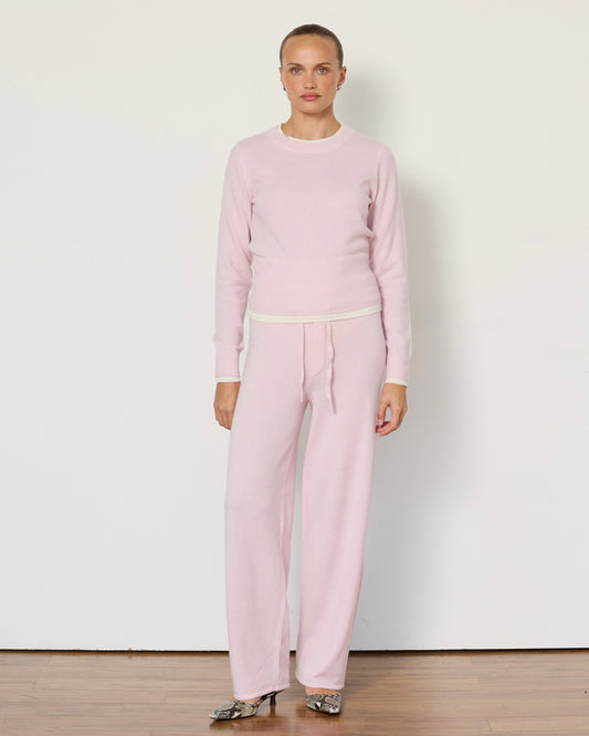 Light gray Tove layered cashmere crewneck sweater by Artless Forever, showing soft fabric and layered design.