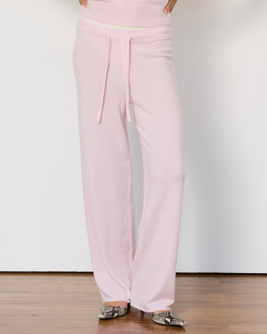Soft beige Tove layered cashmere pants by Artless Forever, featuring a relaxed fit and layered design.