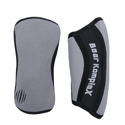 Grey Sharkskin Bear KompleX Knee Sleeves for support and compression during weightlifting and fitness activities.