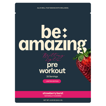 Be Amazing strawberry burst pre-workout powder in a container, with the label visible on the packaging.