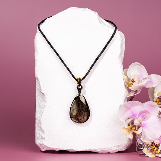 Hypersthene Millionaire Manifestation Necklace by Conscious Items, featuring a polished pendant on a silver chain.