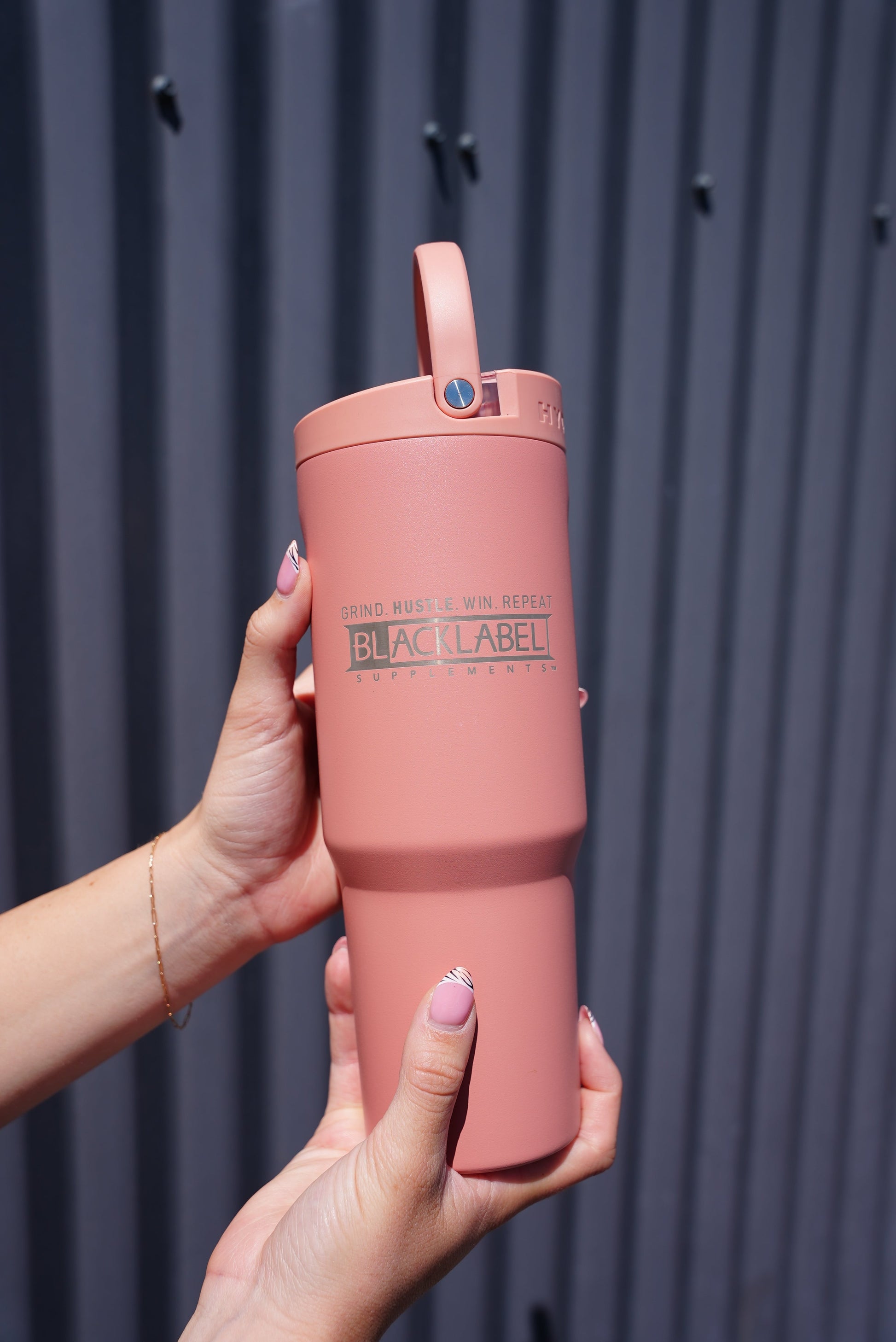 BlackLabel Supplements HydroJug 32 oz. sport cup with ergonomic handle and leak-proof lid for hydration and active use