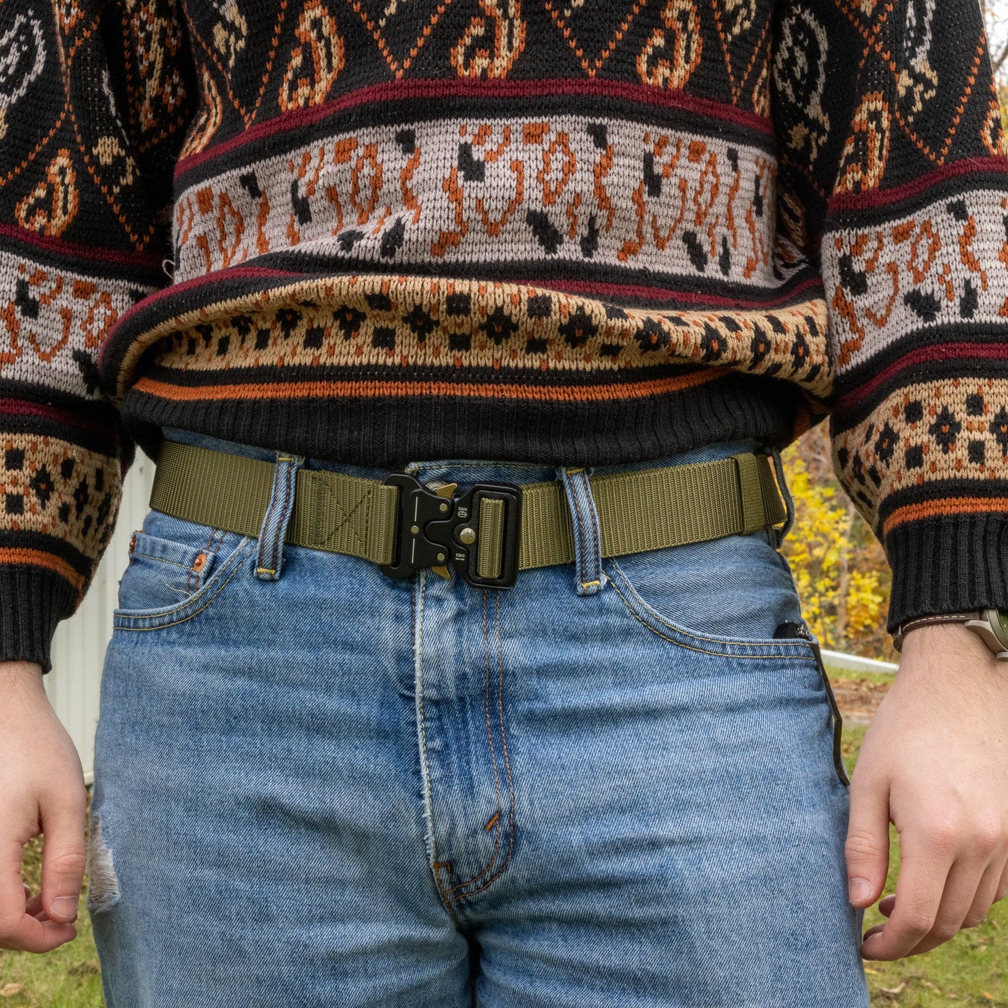 Canvas EDC belt from Americana Pipedream Apparel featuring durable canvas material and metal buckle, displayed on a neutral background.
