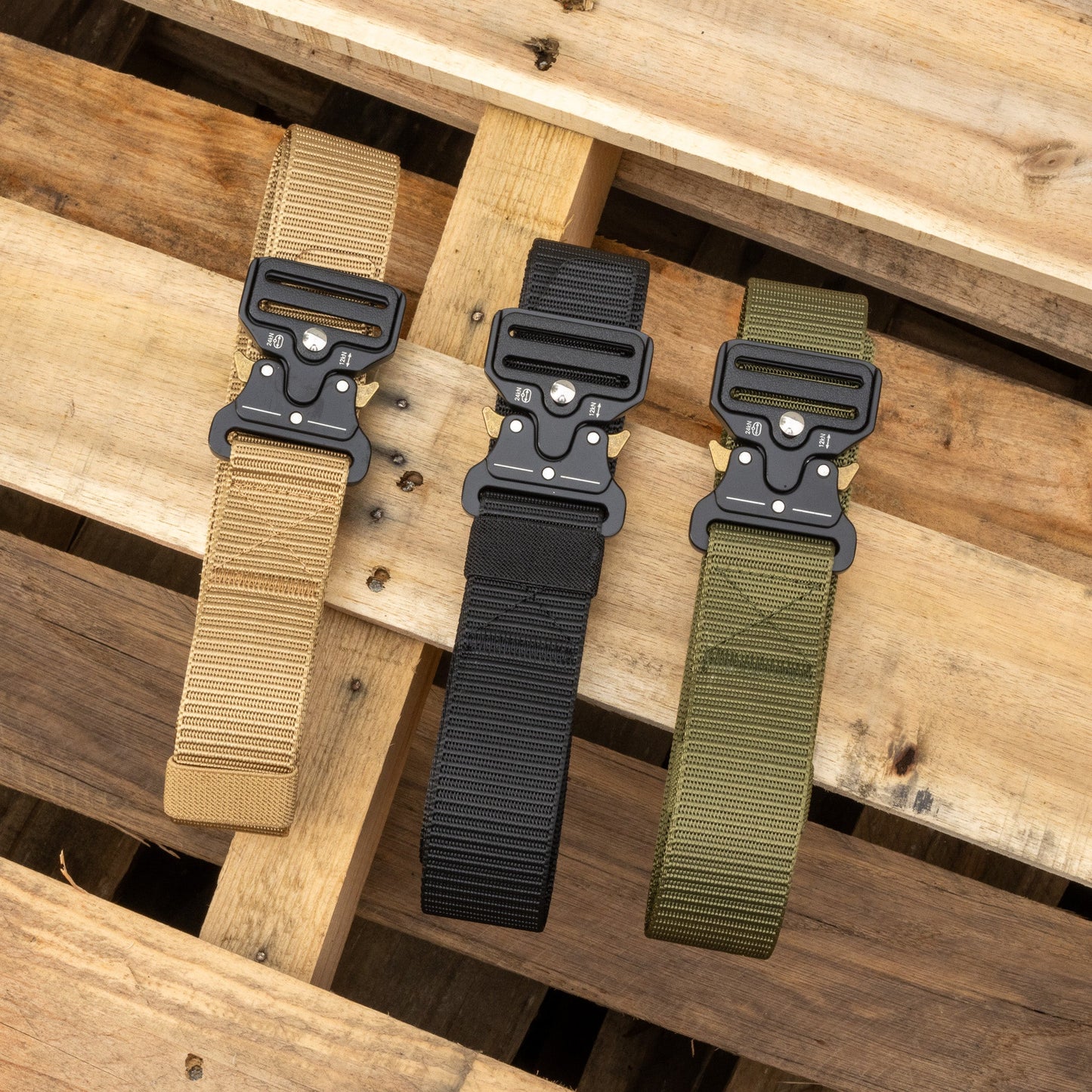 Canvas EDC belt from Americana Pipedream Apparel showing durable beige fabric with metal buckle and reinforced stitching.