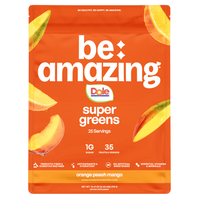 Dole orange peach mango super greens powder by Be Amazing, featuring vibrant green, orange, and peach-colored super greens blend.
