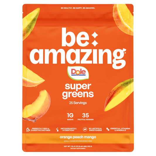 Dole orange peach mango super greens powder by Be Amazing, featuring vibrant green, orange, and peach-colored super greens blend.