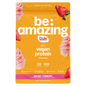 Vegan protein powder by Be Amazing in strawberry flavor, featuring a colorful Dole Whip-inspired packaging with scoop and ingredients.