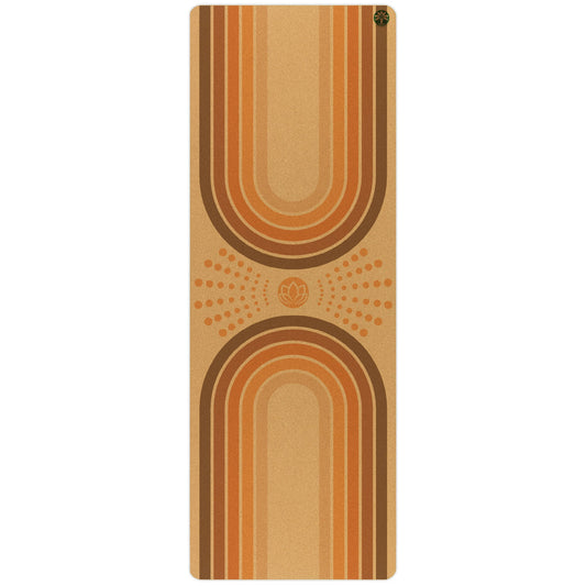 Yoloha Yoga El Dorado Unity Pro cork yoga mat, textured surface, rolled out on a wooden floor for yoga and Pilates practice.