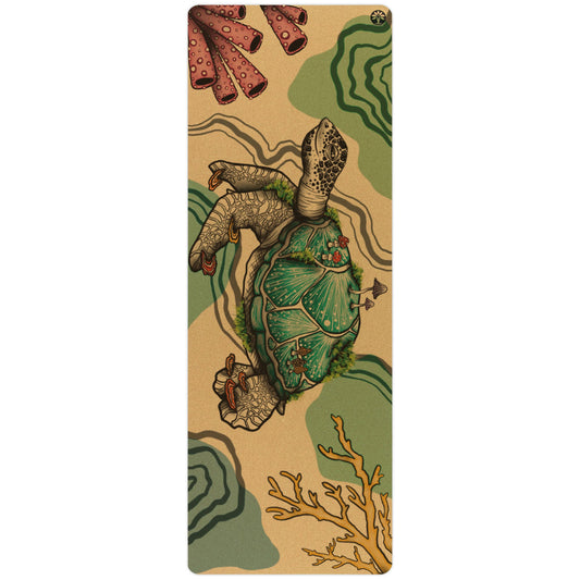 Yoloha Yoga Float On Aura cork yoga mat laid out on wooden floor, showcasing textured surface and natural cork material for yoga and Pilates.