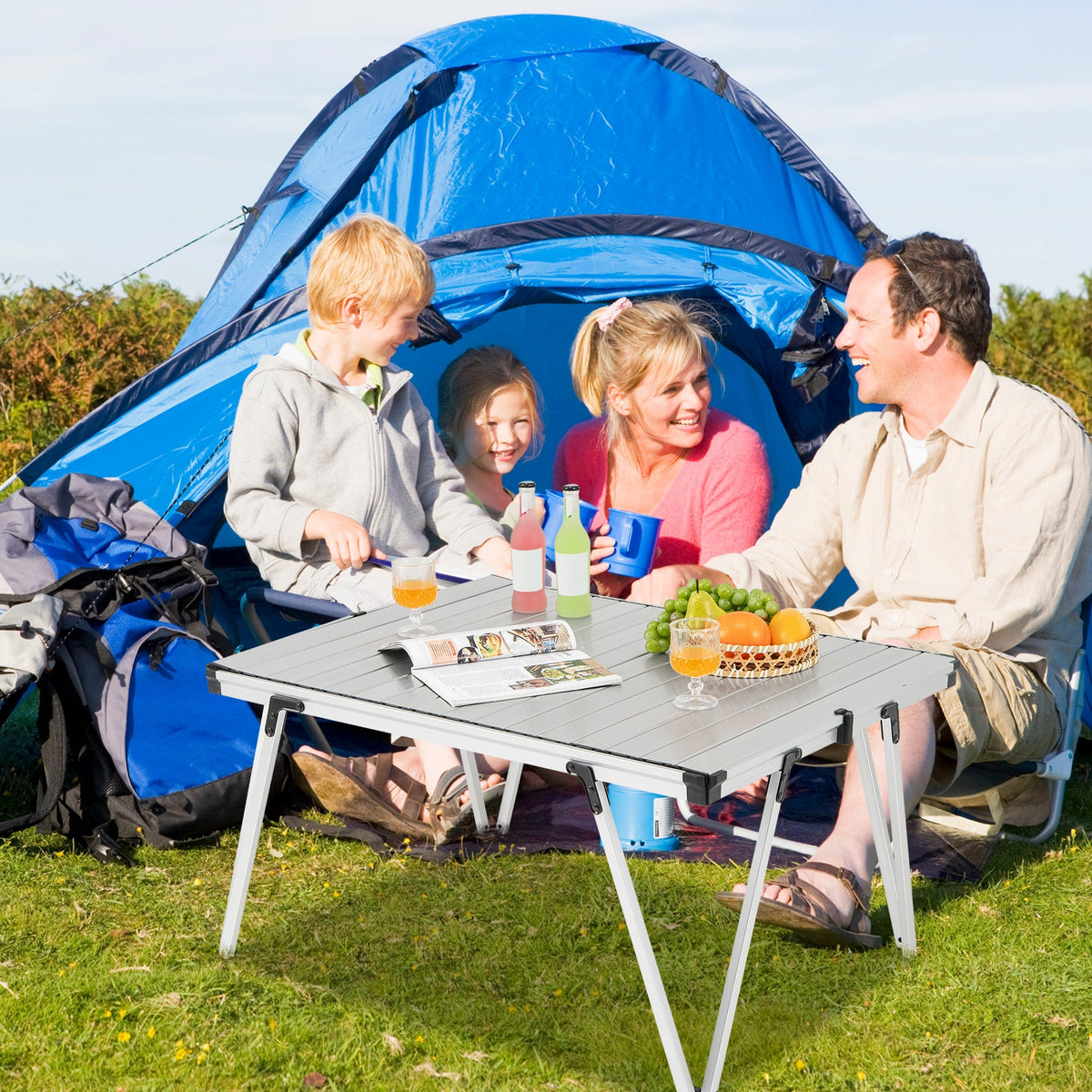 Silver GemGear folding camping picnic table with storage bag and waterproof desktop, ideal for outdoor meals and adventures.