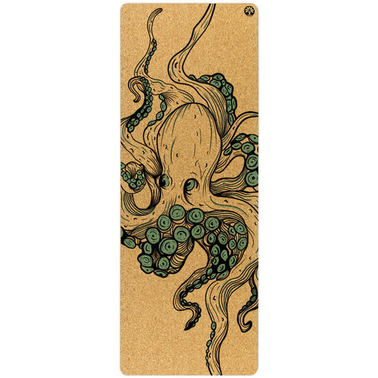 Yoloha Yoga Infinite Transformation Nomad cork yoga mat spread out on the floor, showcasing its textured cork surface and durable design.