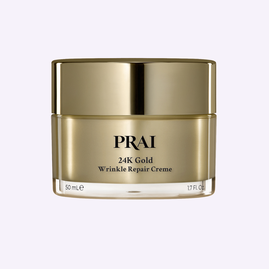 PRAI Beauty 24K Gold Wrinkle Repair Creme in a 50ml jar, featuring luxurious gold-infused skincare for wrinkle reduction.