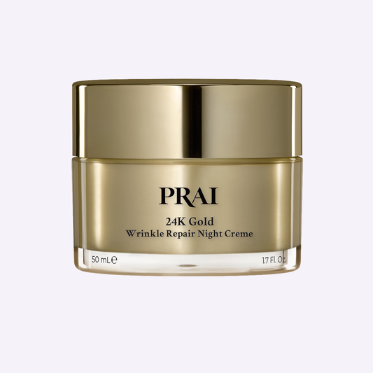 PRAI Beauty 24K Gold Wrinkle Repair Night Creme jar showing luxurious gold cream for anti-aging skincare.