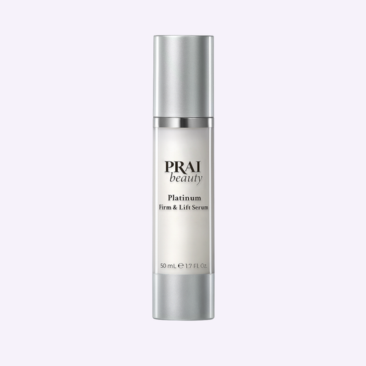 PRAI Beauty Platinum Firm & Lift Serum in a 50ml bottle, showcasing a sleek skincare product for firming and lifting skin.